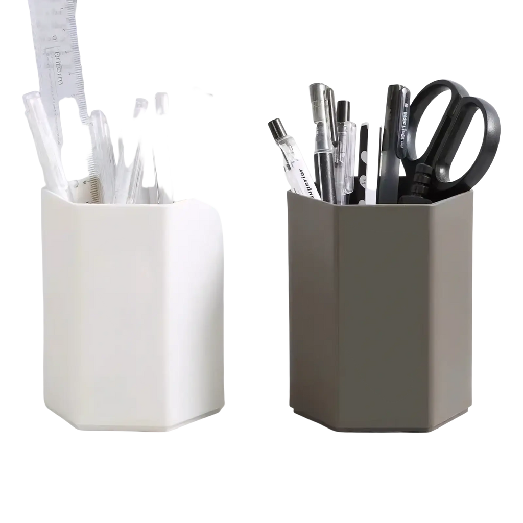 Two hexagonal plastic pen holder desk organizers in white and olive green filled with pens pencils and scissors
