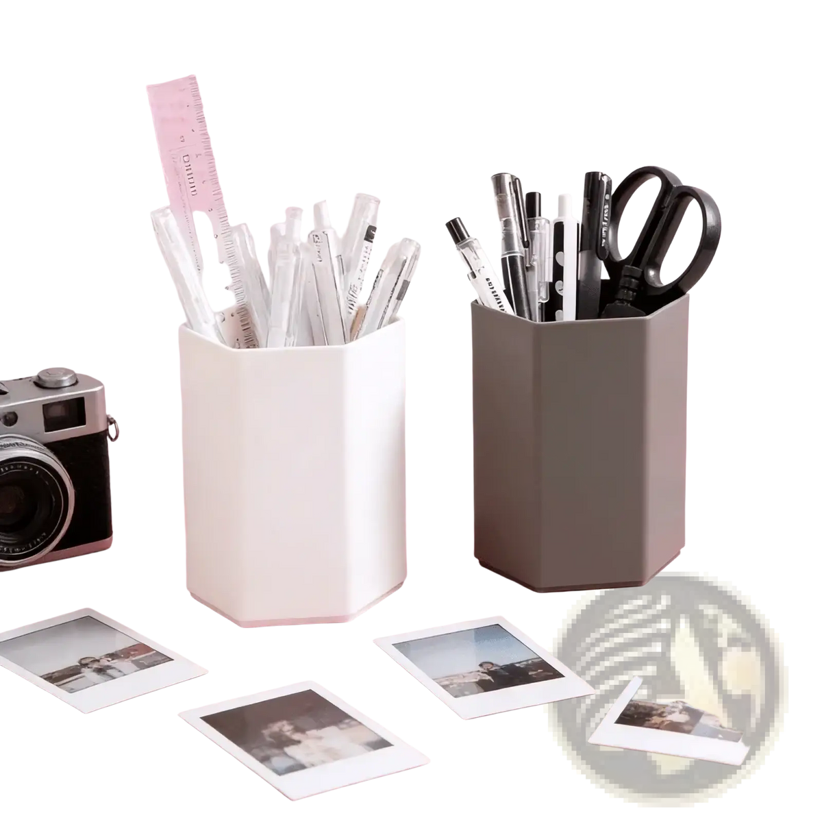 White hexagonal plastic pen holder desk organizer filled with pens and a ruler for efficient desk storage