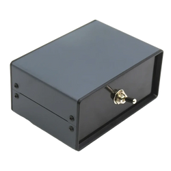 Black rectangular metal hifi audio switcher 2 way speaker selector box with a silver toggle switch on the front panel