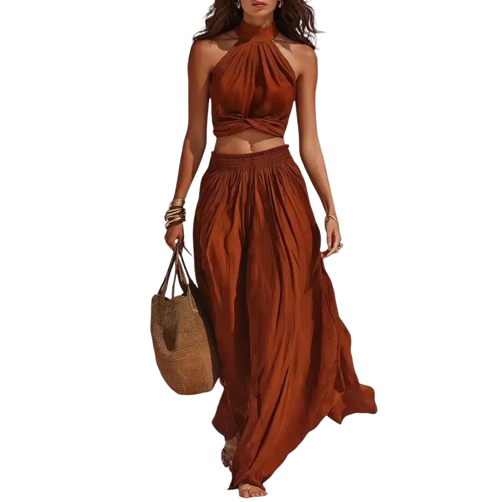 A rust-colored high neck halter 2 piece set with twisted front and matching high waist wide leg pants length