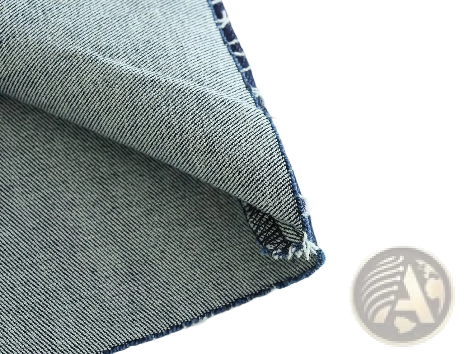 Close-up of faded blue denim fabric with stitching and frayed edges on high neck navy velvet zip front maxi dress