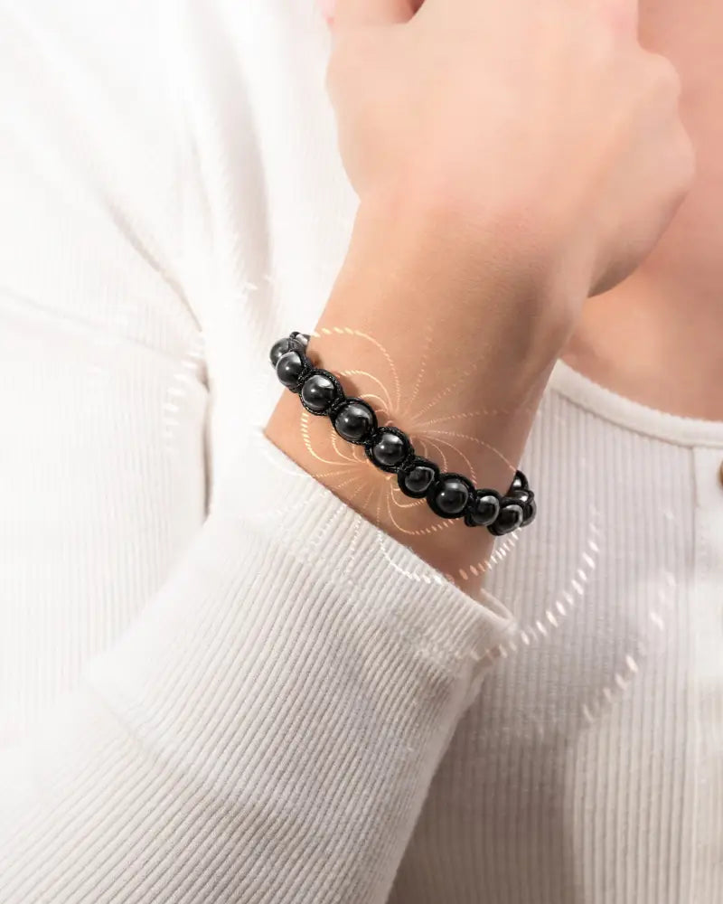 Black beaded bracelet with smooth round hematite stones featuring high power magnetic properties from Bali