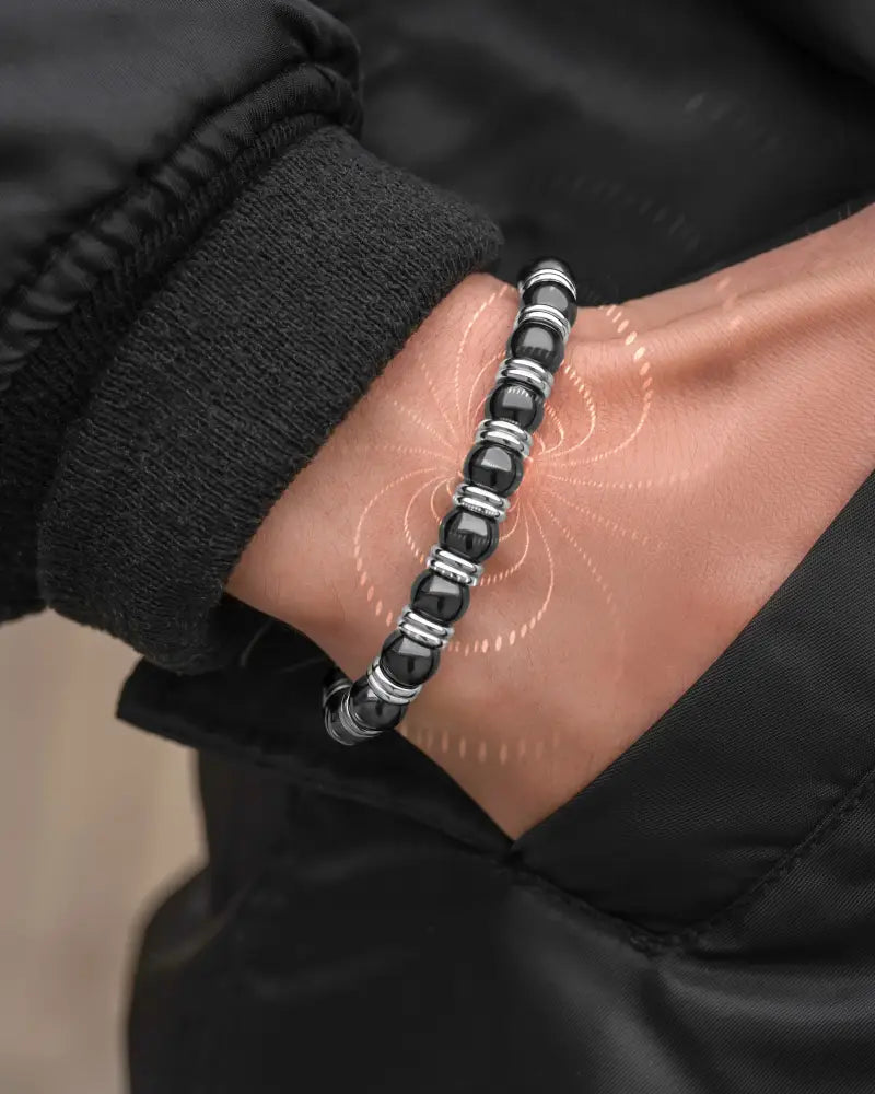 Silver titan magnetic hematite beaded bracelet with alternating matte black spherical beads and polished silver spacers