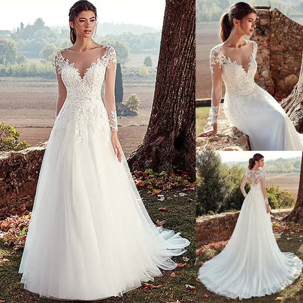 A white lace long sleeve a-line tulle wedding gown with a flowing skirt for bridal wear