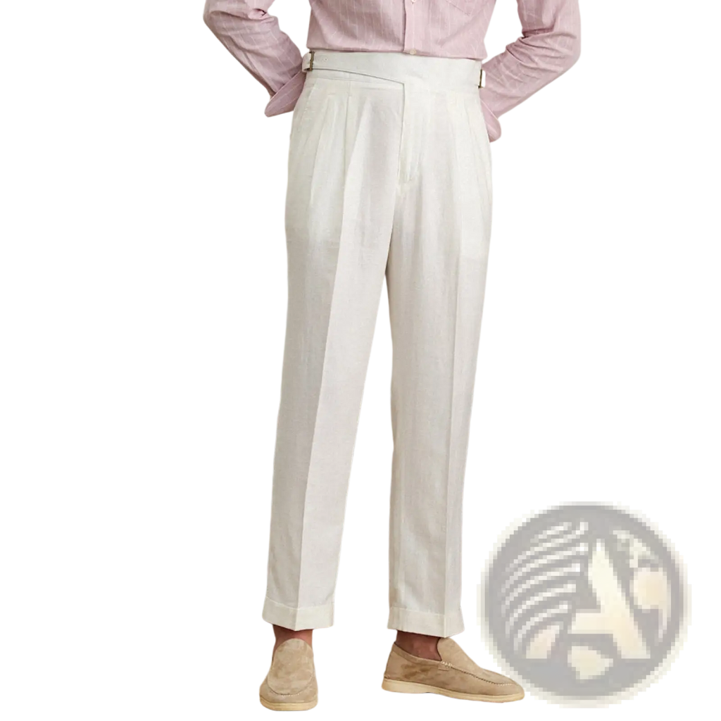 White high waist cotton linen pleated trousers with tailored fit straight leg and rolled cuffs