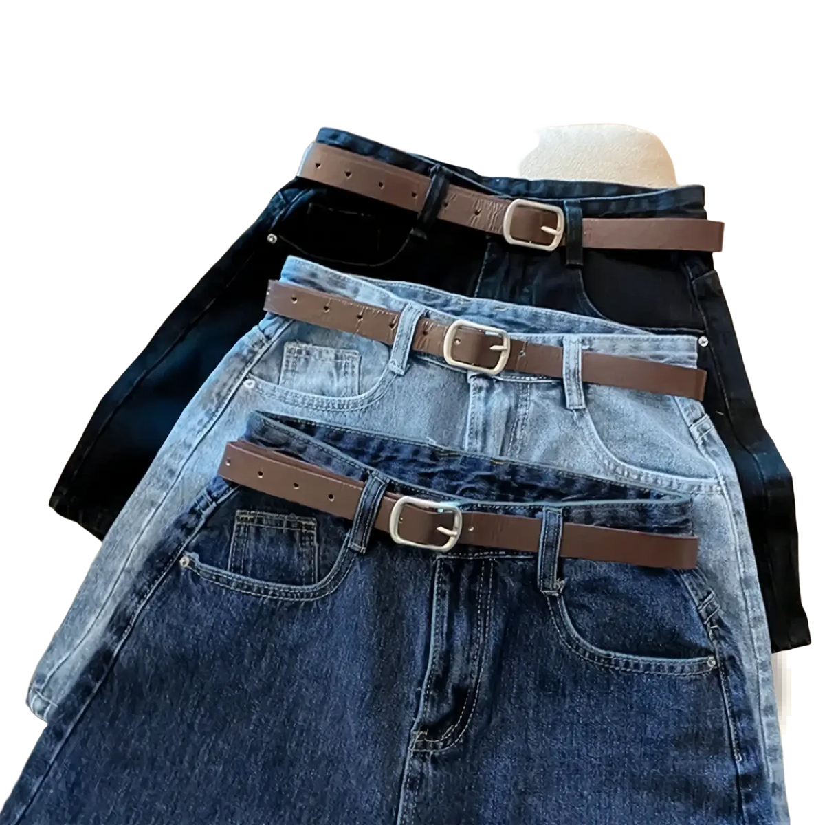 High waist denim shorts featuring brown leather belts with silver toned buckles displayed across the fabric