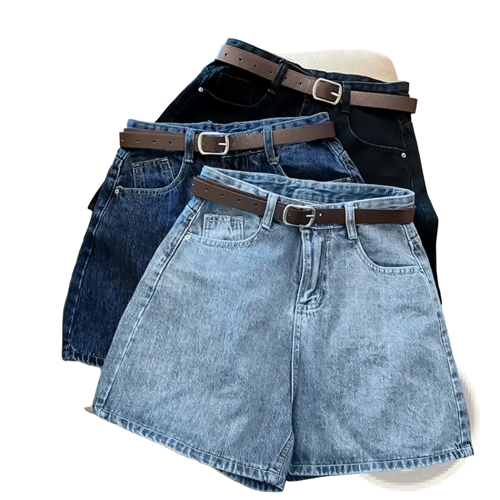Three high waist denim shorts in varying blue shades paired with brown leather belts with silver buckles