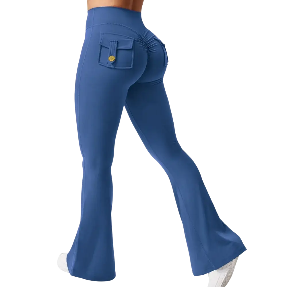 Blue high waist flared yoga leggings shown from back with ruched detail and front pocket with gold button closure