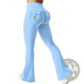 Light blue high waist flared yoga leggings shown from the back with ruched pocket and gold toned button detail