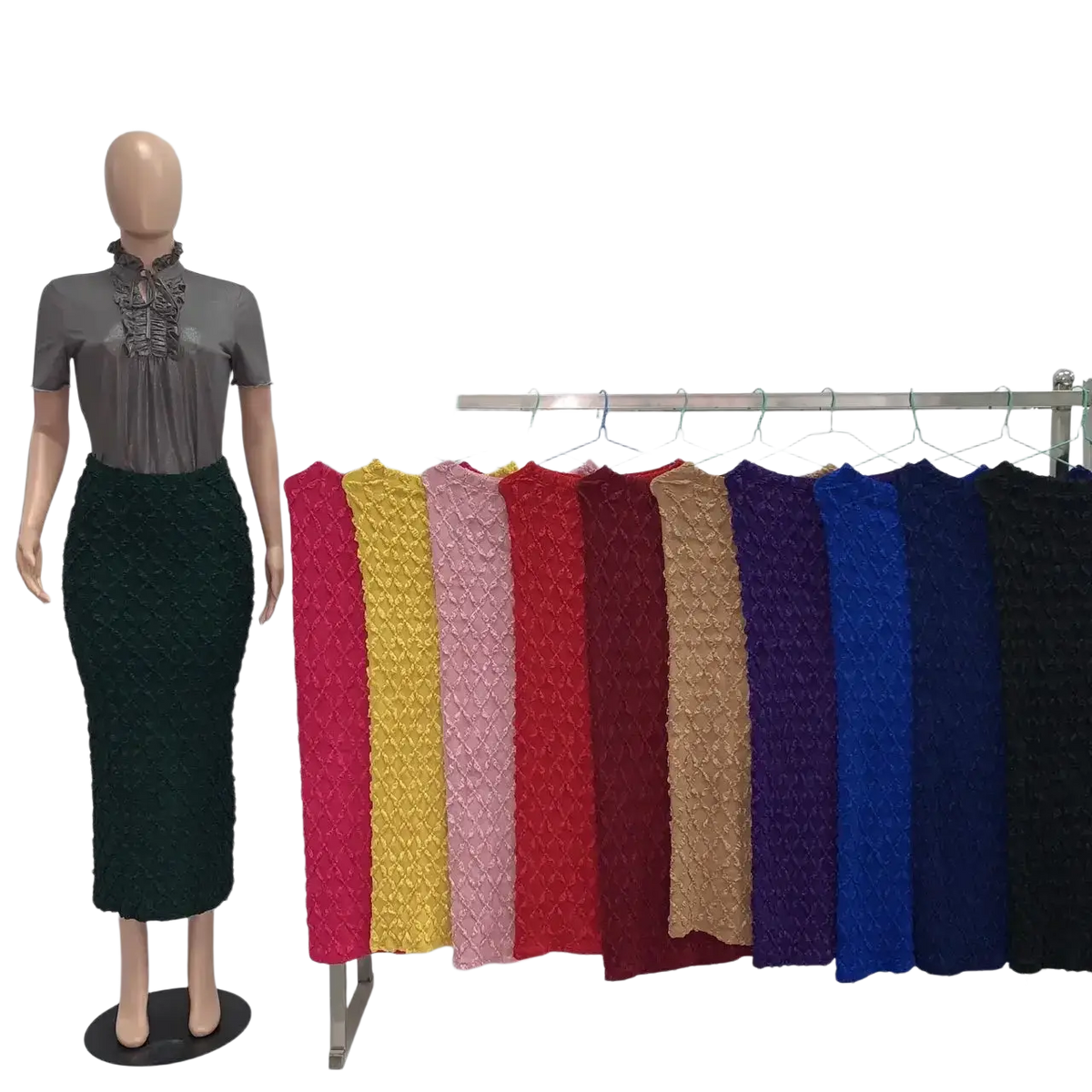 A mannequin wears a high waist dark green textured knit midi skirt with a slim fit silhouette
