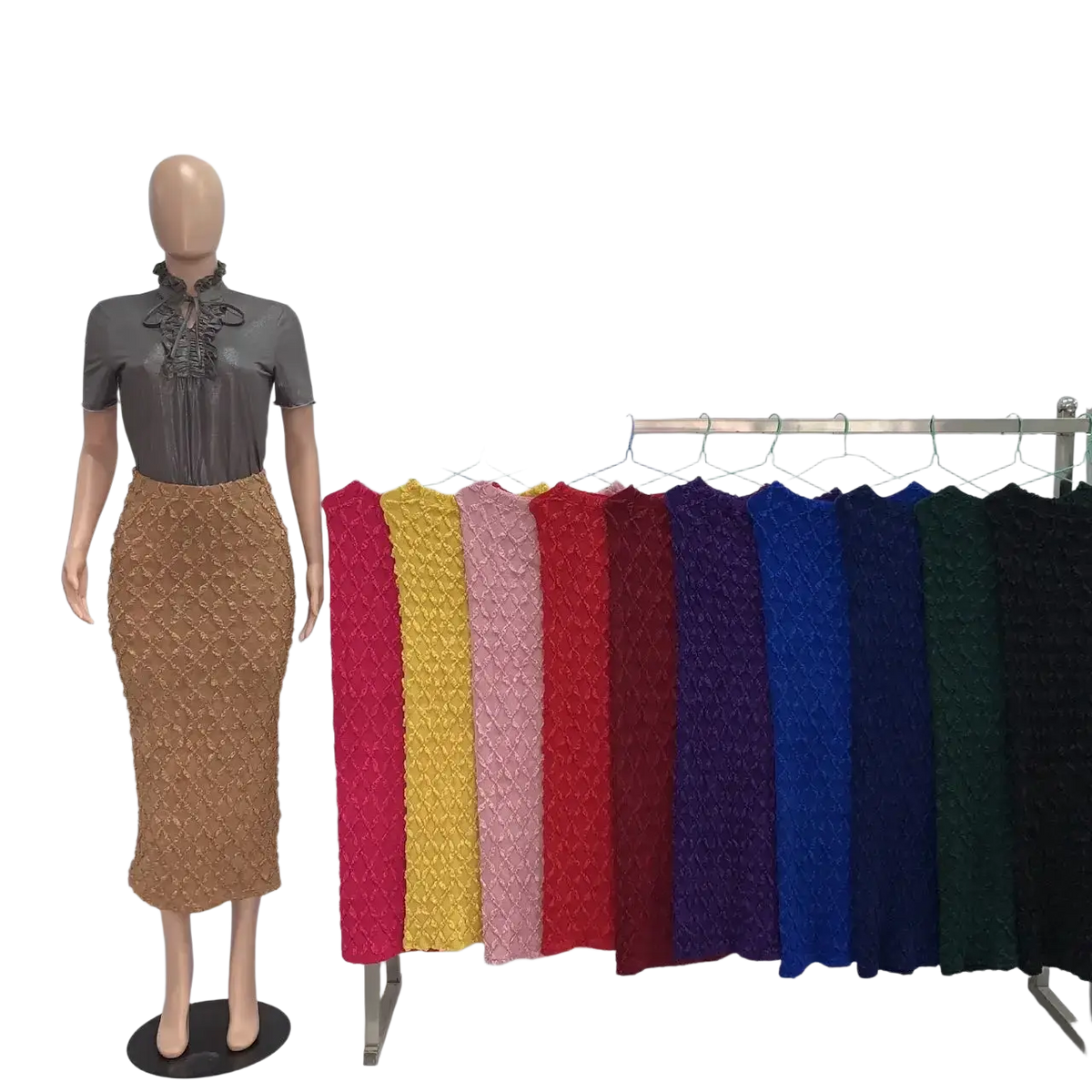 The mannequin wears a gray blouse and a slim fit high waist knit midi skirt in textured brown