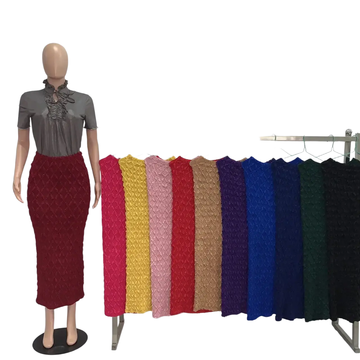 A high waist slim fit midi skirt in rich red textured ribbed knit displayed on a mannequin