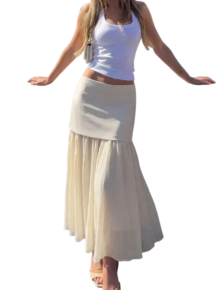 High waist pleated long skirt in two-toned cream with a fitted top and voluminous layered chiffon bottom