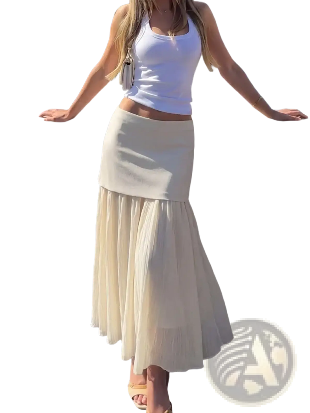 A flowing off-white high waist pleated long skirt with a fitted waistband in a soft fabric for elegant wear