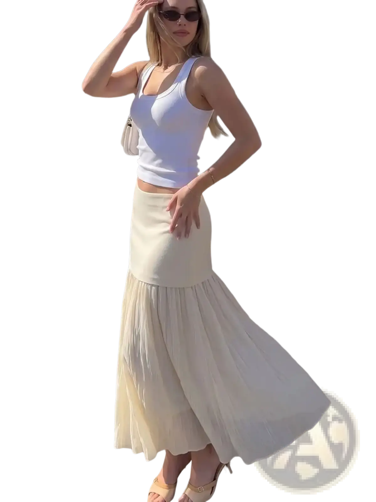 White sleeveless crop top with square neckline paired with high waist pleated long skirt in fitted silhouette