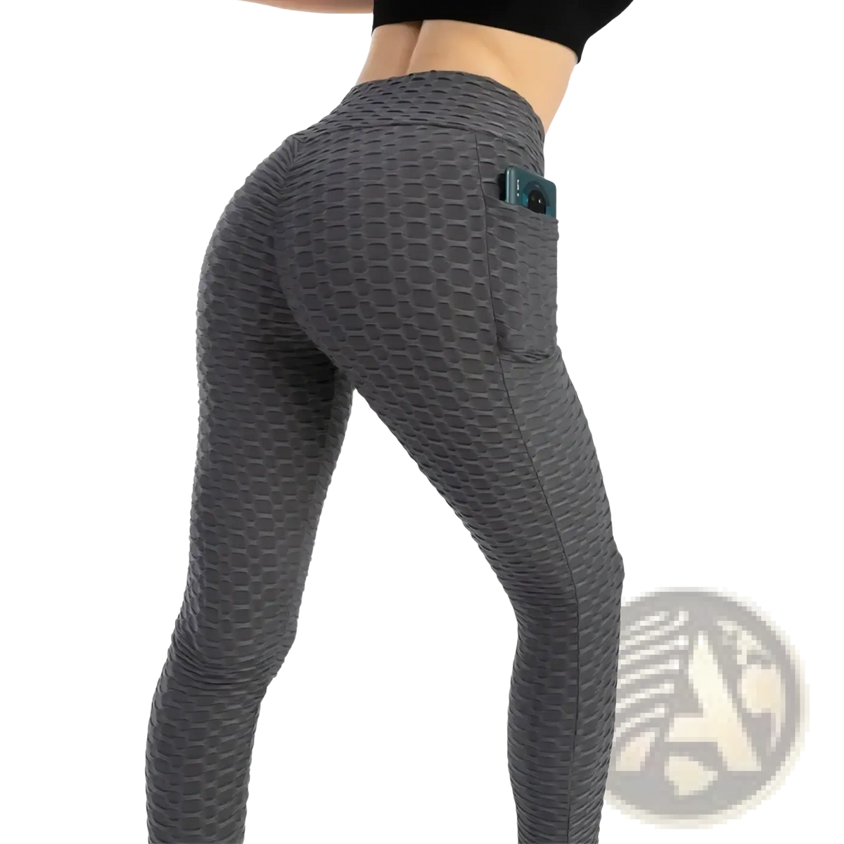 Gray high waist pocket bubble leggings with honeycomb texture and side pocket holding a phone for active wear