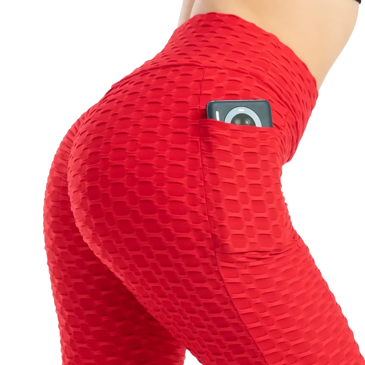 Red textured high waist pocket bubble leggings featuring a built in side pocket holding a smartphone