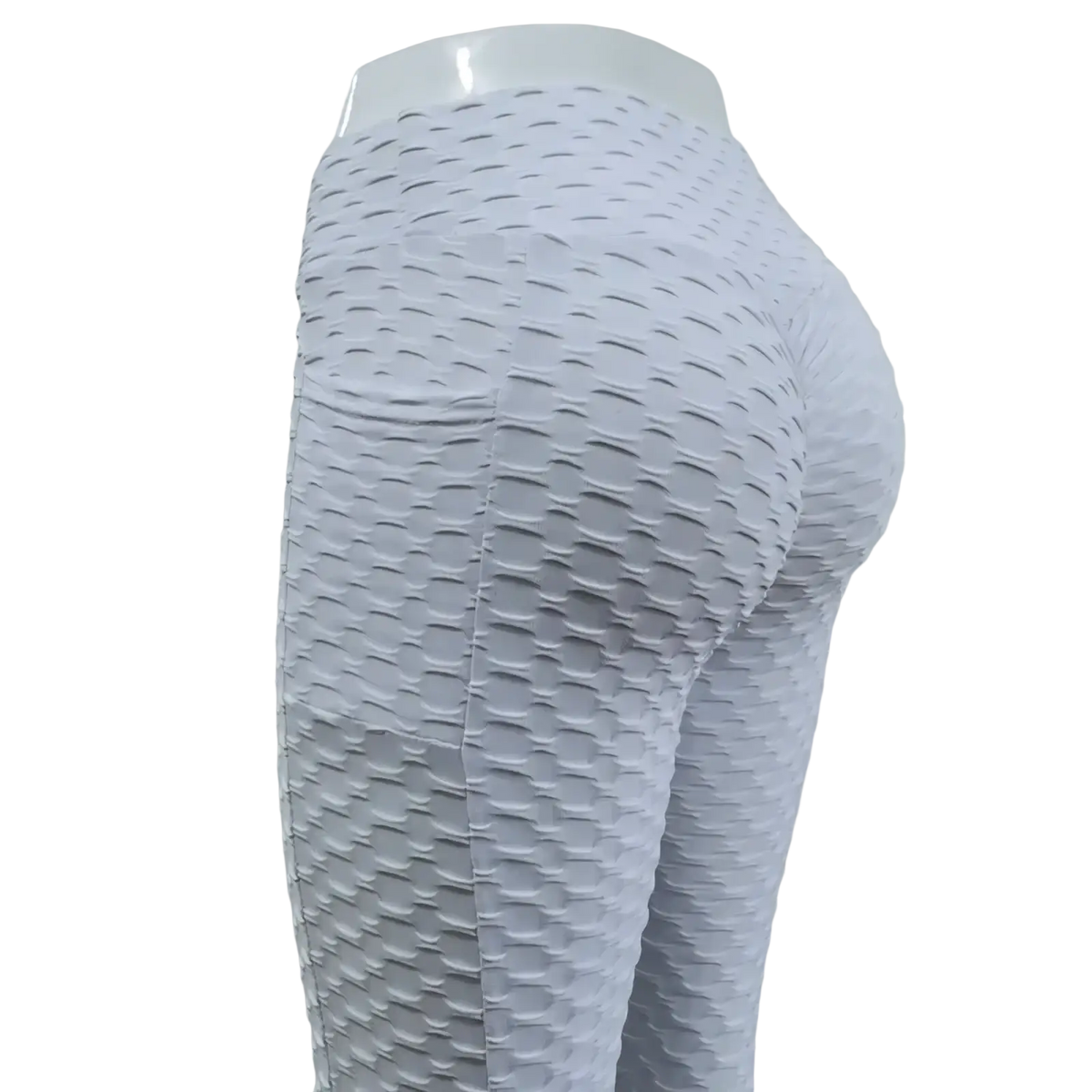 High waist pocket bubble leggings in white with a textured raised scale like pattern on the fabric