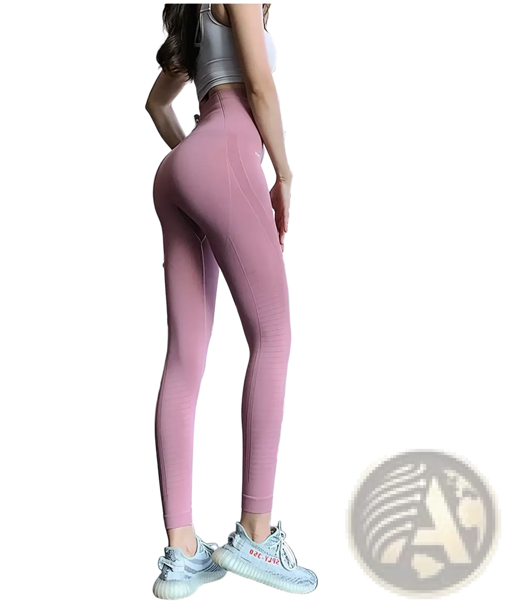 Pink high waist seamless gym leggings for women made of stretchy, form-fitting material designed for exercise