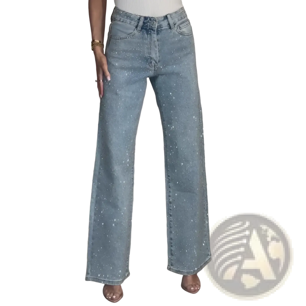 High waist light-wash denim jeans with wide-leg cut and scattered silver glitter accents star print design
