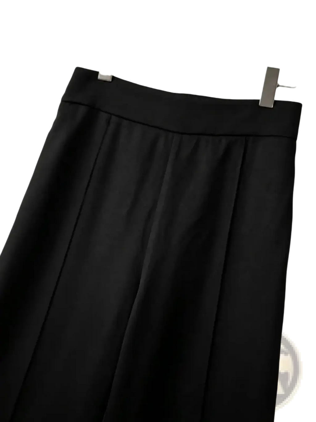 Black high waist wide leg trousers with a smooth tailored waistband and pleated skirt detail