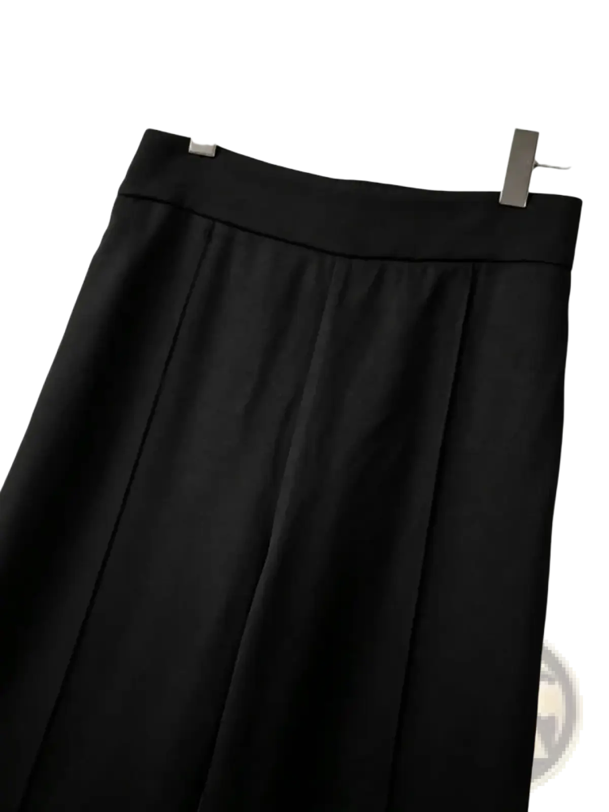 Black high waist wide leg trousers with a smooth tailored waistband and pleated skirt detail