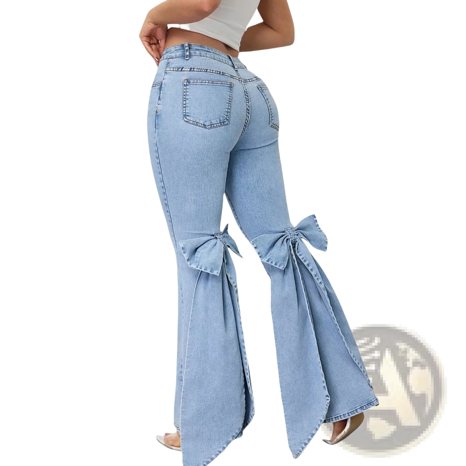 High waisted light blue denim flare jeans with decorative bows at the knees in light-wash fabric