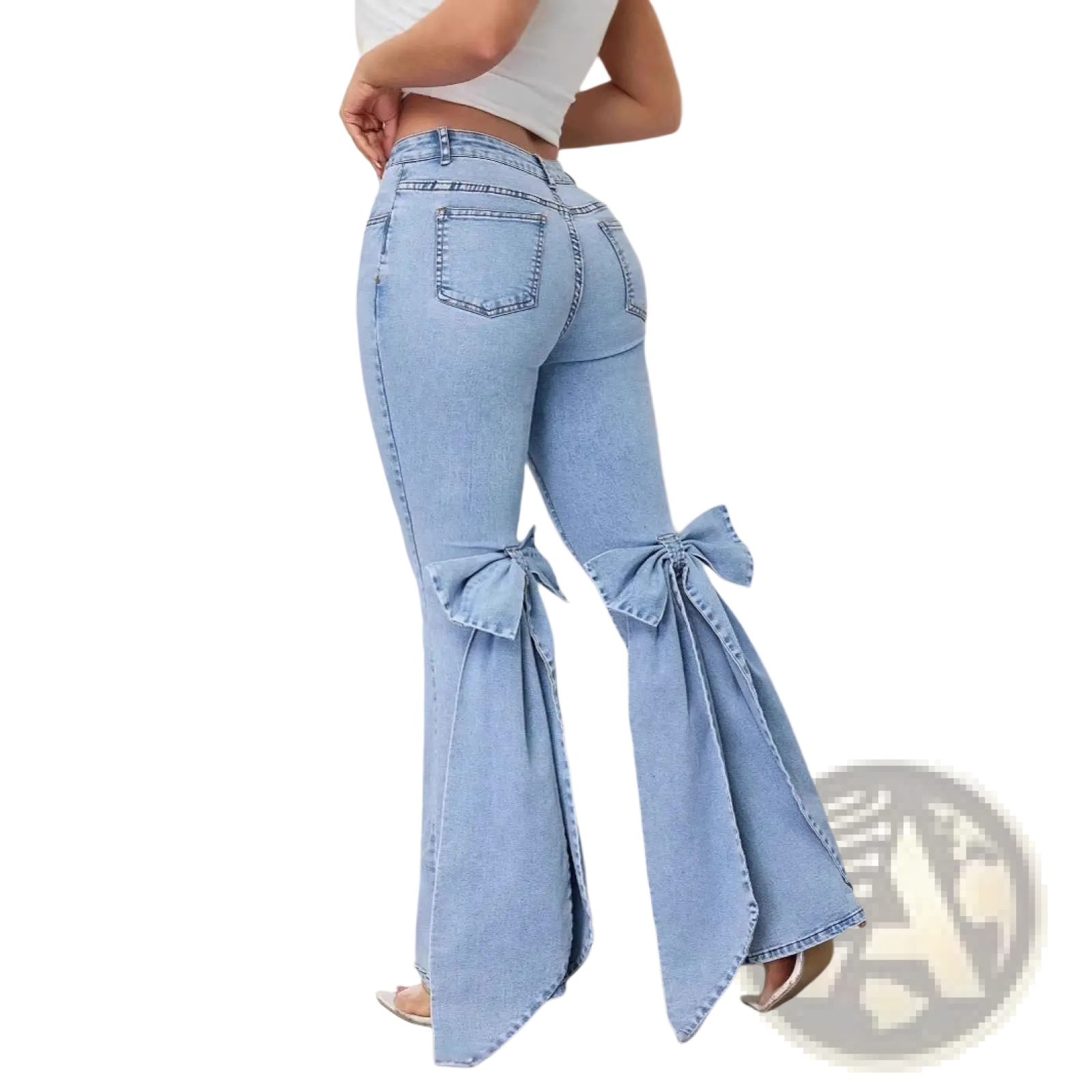 High waisted light blue denim flare jeans with decorative bows at the cuffs in light wash denim material