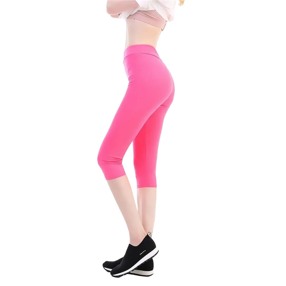 Bright pink high waisted capri yoga leggings made of stretchy fabric with a form-fitting design