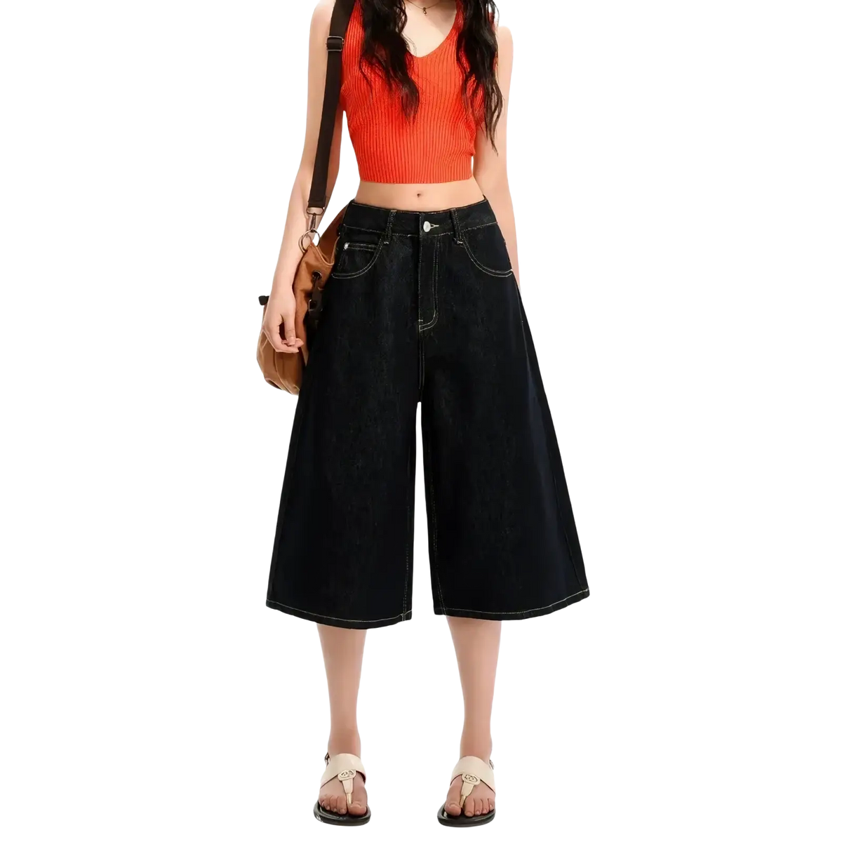 Dark-wash denim culottes with a high waist and wide-leg cut styled as y2k inspired high waisted denim shorts