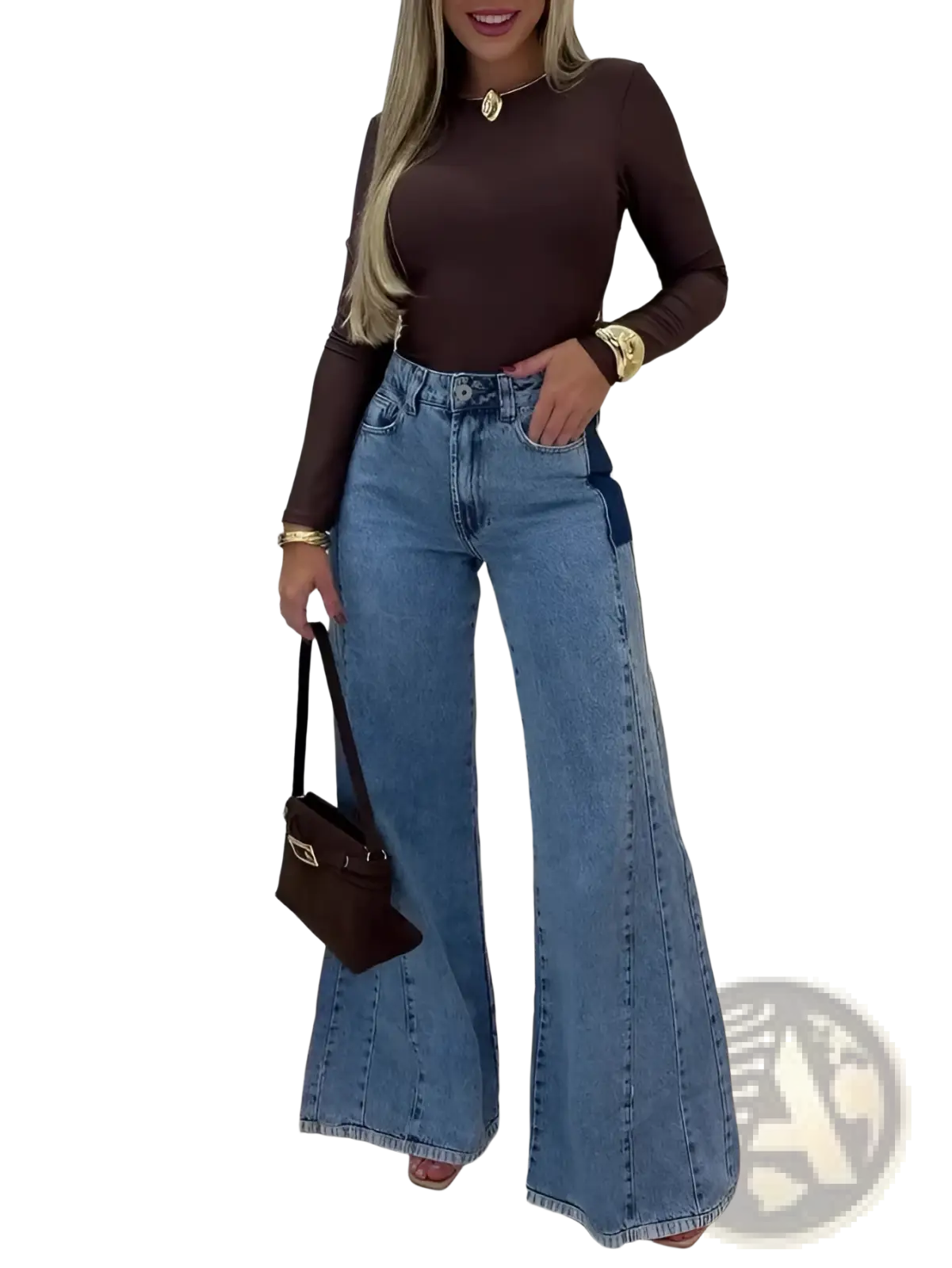 Brown leather handbag with black strap and gold-tone hardware paired with high waisted flared light blue denim jeans