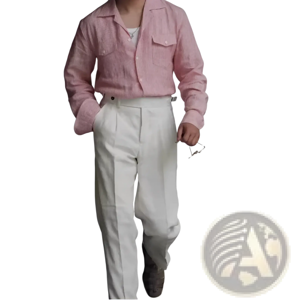 A light pink long-sleeved button-up shirt with subtle textured weave and chest pockets paired with high waisted linen trousers men