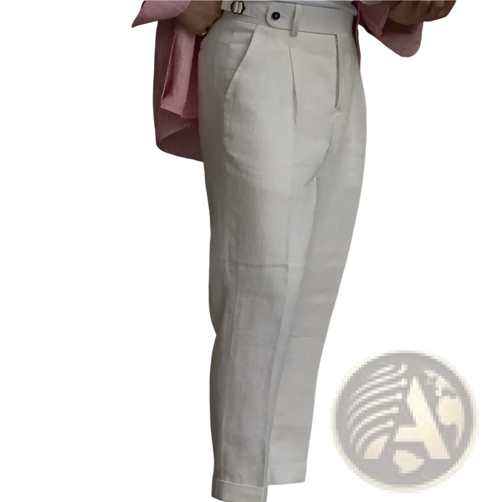 White high waisted linen trousers for men featuring a pleated front and tailored fit