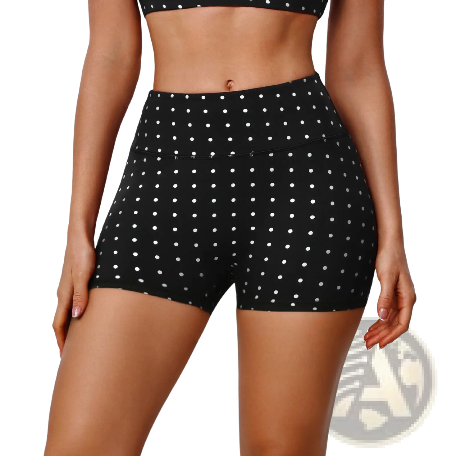 Black high waisted cycling shorts with white polka dots featuring a comfortable stretch fabric for active wear