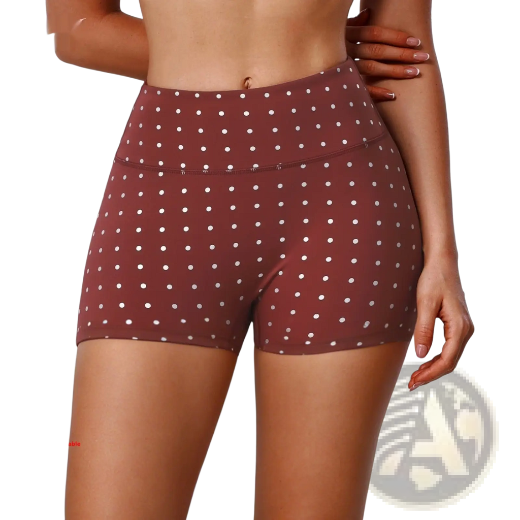 Brown high waisted cycling shorts with white polka dots designed for comfortable active wear