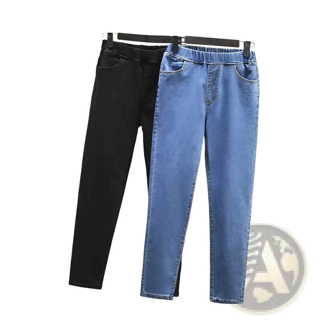 A pair of black and blue high waisted stretch denim jeans with elastic waistbands hanging side by side