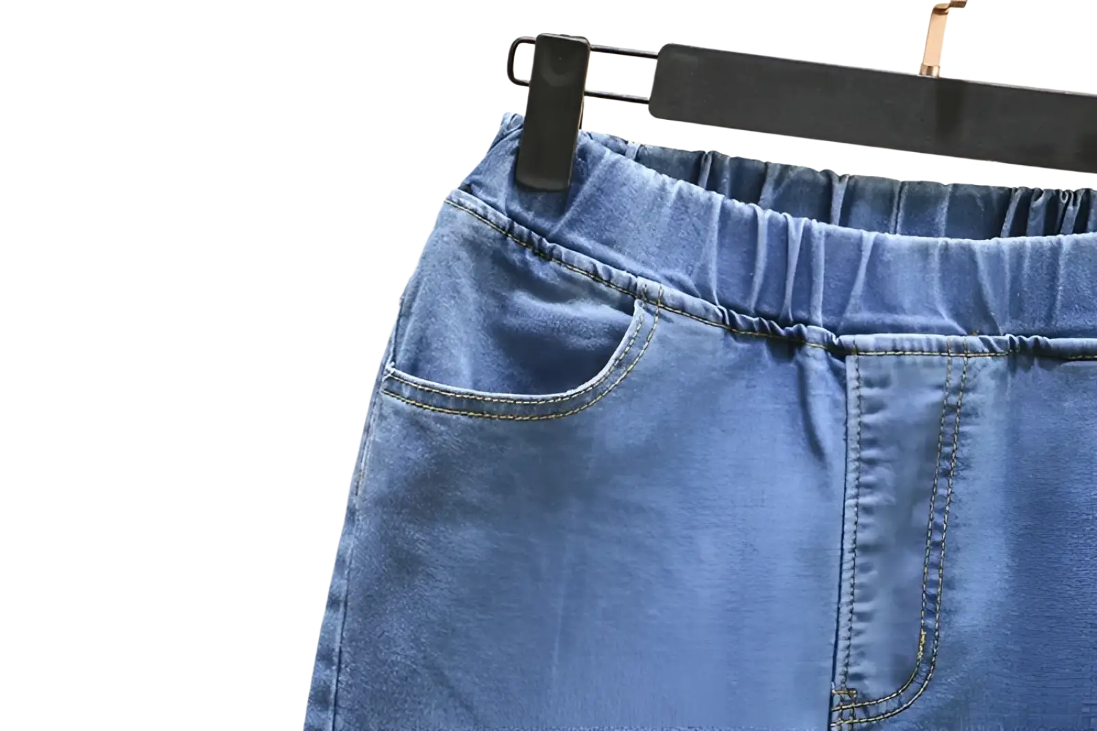 High waisted stretch light blue denim skirt with elastic waistband and front pockets in soft denim material