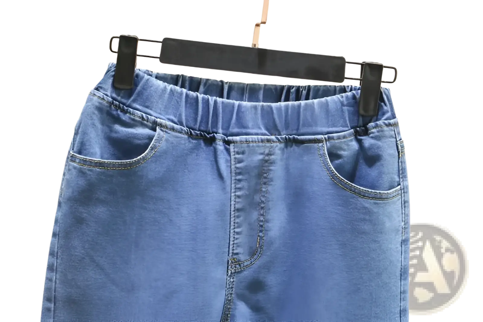 High waisted stretch light blue denim jeans with elastic waistband and front pockets made of light blue denim
