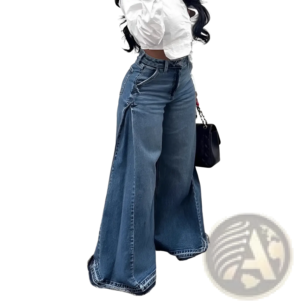 High waisted wide leg blue denim jeans with a distressed frayed hem and side seam detailing