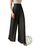 Black high waisted wide leg trousers with a sleek tailored fit and subtle front pleats in a smooth fabric