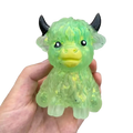 Highland cow sensory fidget toy in translucent lime green with fuzzy texture for stress relief and sensory fidget use