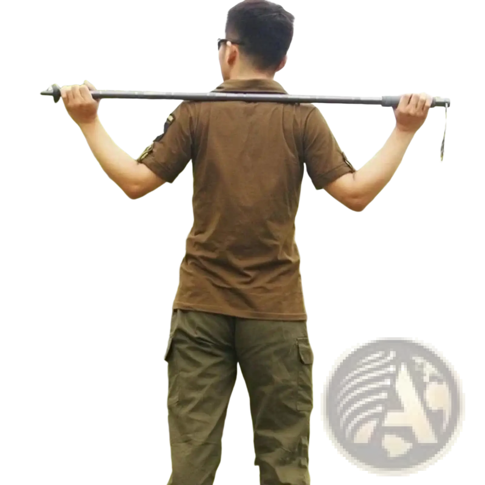 Black telescopic hiking pole with adjustable sections and textured grip in camping set with tactical knife visible