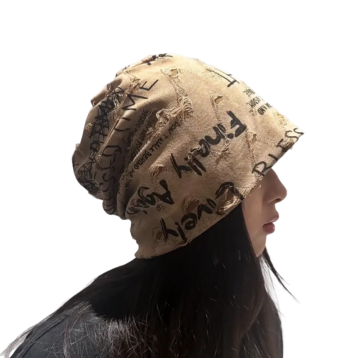 Beige slouchy knit beanie hat with black graffiti-style newspaper print and distressed frayed edges for hip hop style