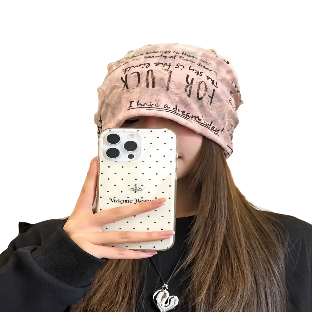 Pink satin shower cap with black handwritten style text design matching hip hop newspaper print knit beanie hat