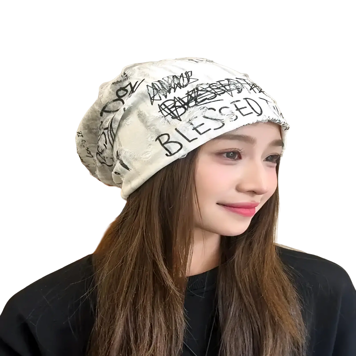 White soft-textured knit beanie hat with black graffiti-style lettering and blessed print hip hop newspaper design