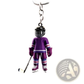 Purple hockey player acrylic keychain with black helmet and silver accents for sports backpack charm
