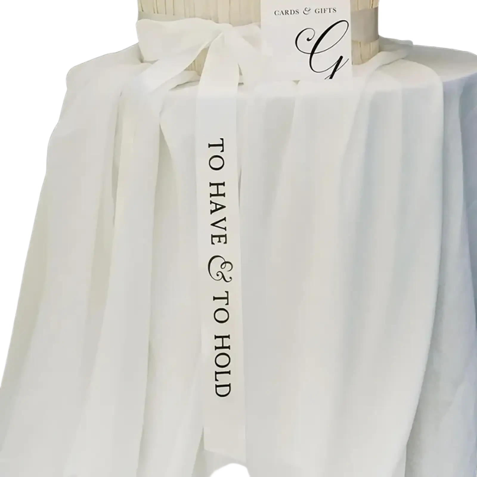 White satin To have and to hold wedding ribbon band with black cursive text tied in a bow
