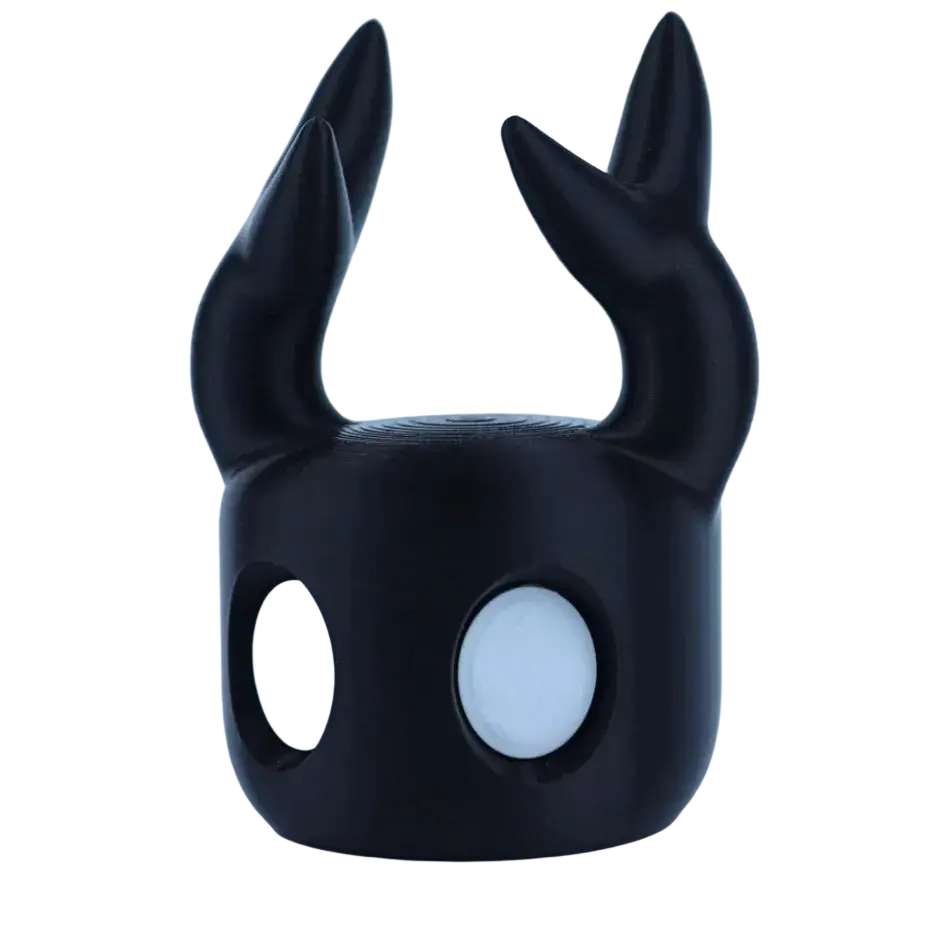 Black glossy plastic hollow knight game controller stand for ps5 with two pointed horns and circular white eyes