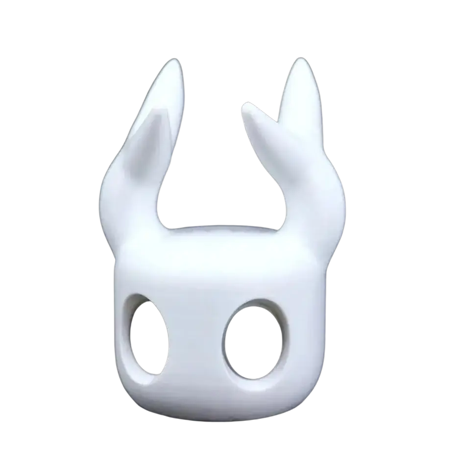 White smooth-surfaced hollow knight game controller stand for ps5 with pointed ears and large black eye holes