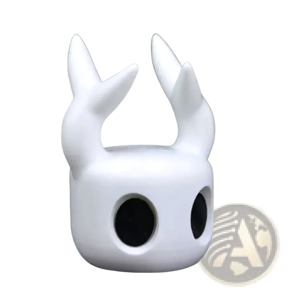 White smooth-surfaced Hollow Knight gaming controller stand figurine with upward-curving horns and large black eye openings